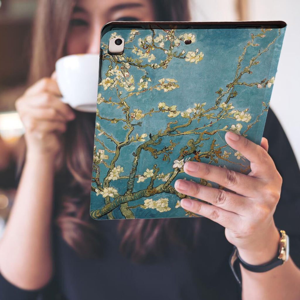 a girl is holding and viewing personalized iPad folio case with Oil Painting design