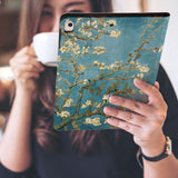 a girl is holding and viewing personalized iPad folio case with Oil Painting design