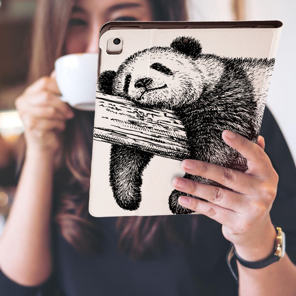 a girl is holding and viewing personalized iPad folio case with Cute Animal design