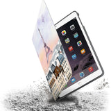 Drop protection from the personalized iPad folio case with Travel design