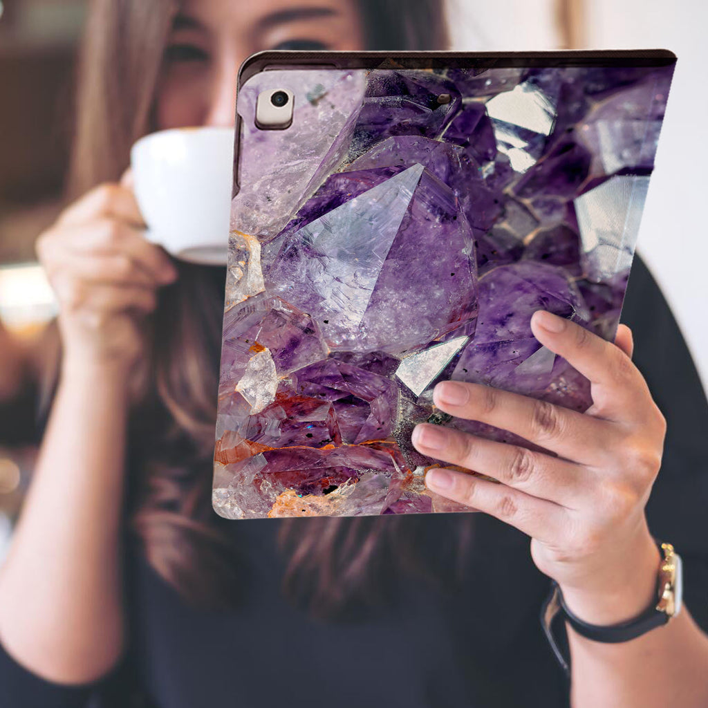 a girl is holding and viewing personalized iPad folio case with Crystal Diamond design