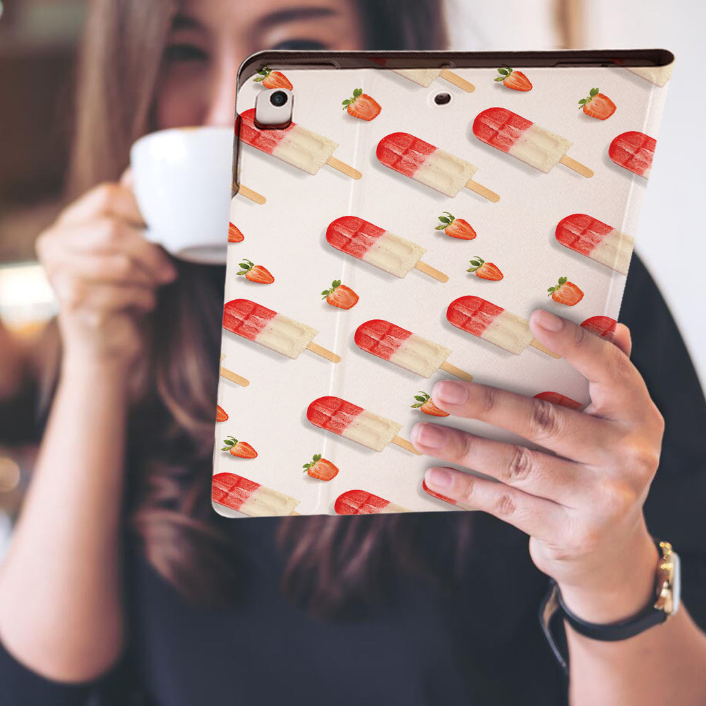 a girl is holding and viewing personalized iPad folio case with Sweet design