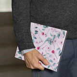 A business man holds Personalized VistaCase reMarkable Pen Holder Case with Flat Flower 2 design