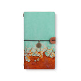 the front top view of midori style traveler's notebook with Rusted Metal design