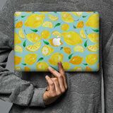 Form-fitting hardshell with Fruit design keeps scuffs and scratches at bay