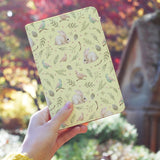 a girl holding personalized RFID blocking passport travel wallet with Forest Baby design