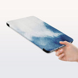 a hand is holding the Personalized Samsung Galaxy Tab Case with Abstract Ink Painting design